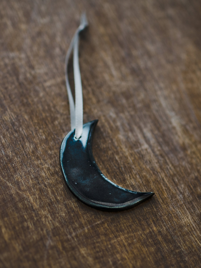 dark blue crescent moon hanging decoration