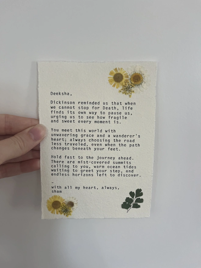 Print typed on an antique vintage typewriter onto handmade cotton rag deckled paper. Decorated with real dried pressed flowers. 