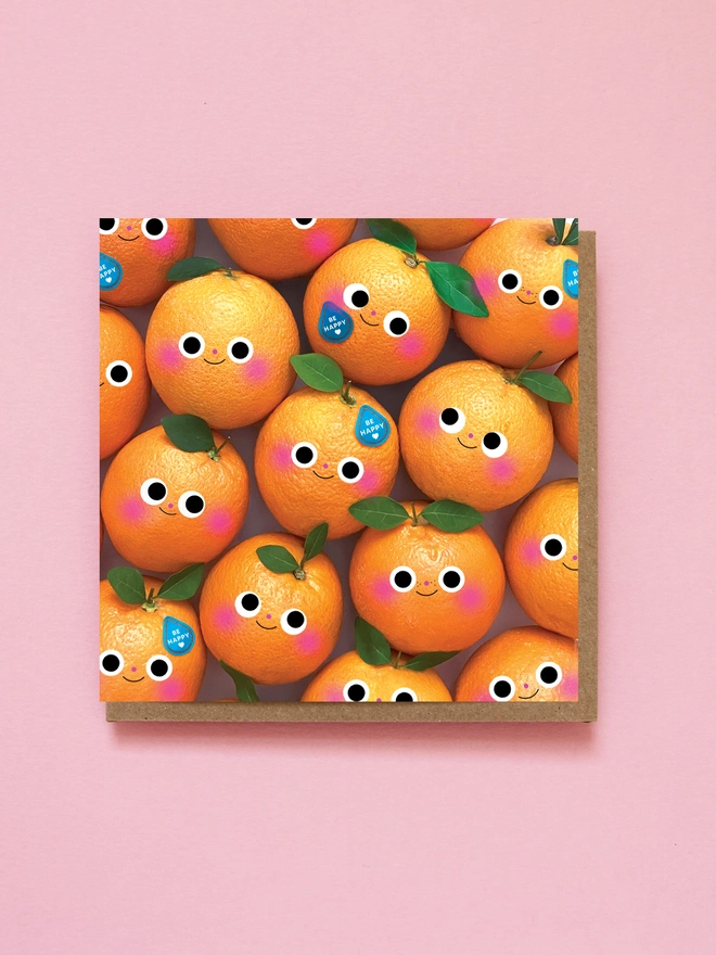 A selection of Oranges smiling with Be happy stickers 