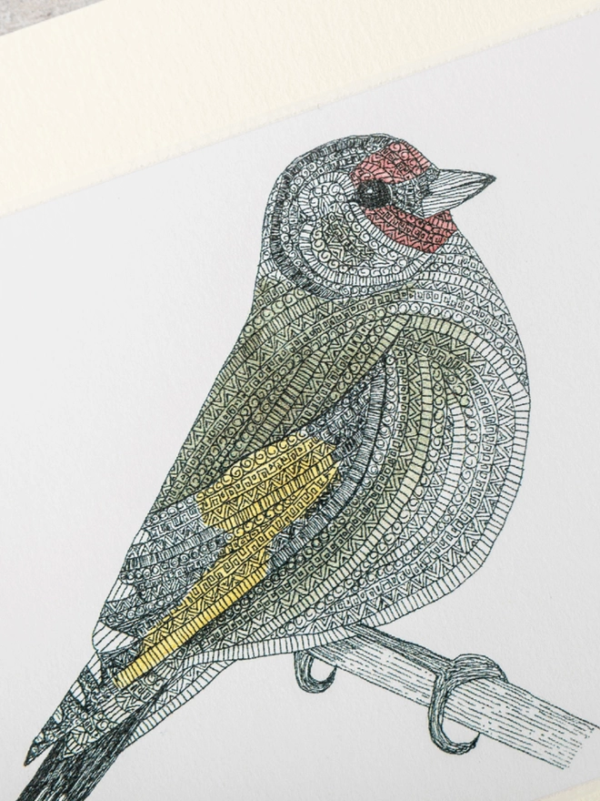 Note card with intricately patterned pen and watercolour drawing of a Goldfinch bird, in a soft white mount
