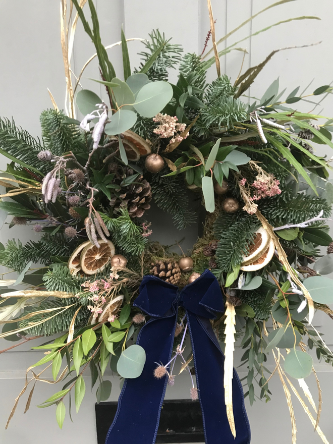 Christmas Tonic Fresh Wreath with citrus slices, gold crab apples and Eucalyptus