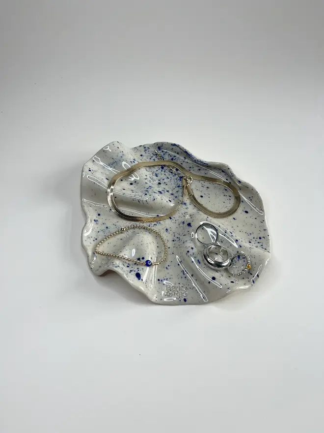 Jewellery Platter, singularly on a table. 