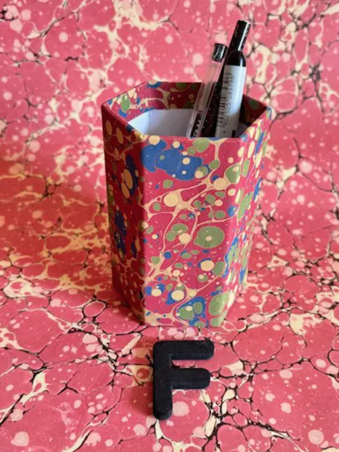 Pen Pot. A pen pot in F