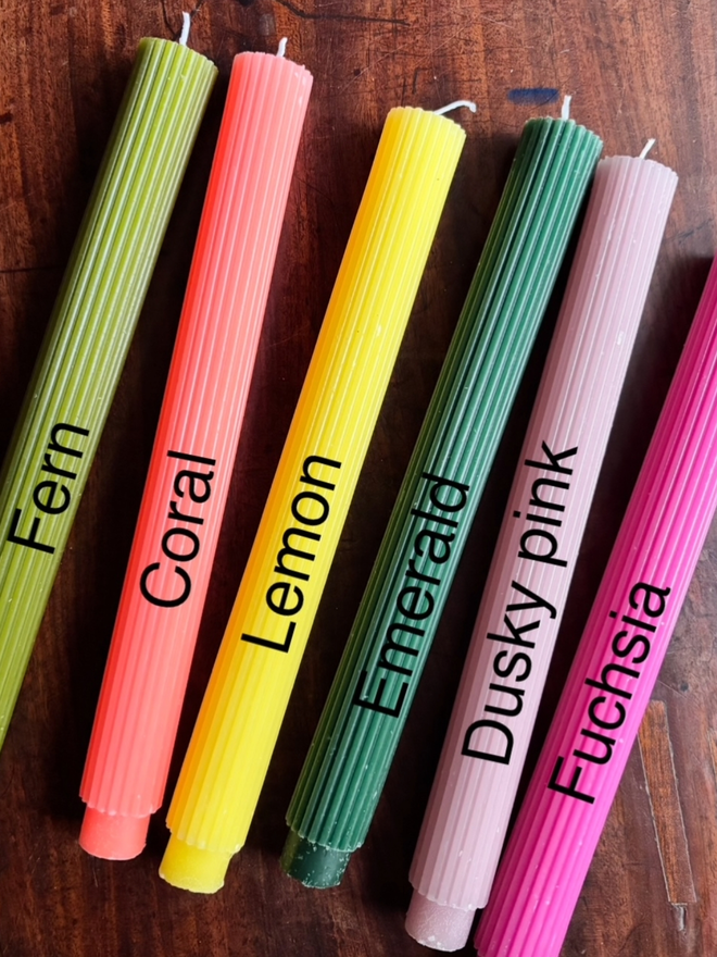 Wrapped Scalloped Dinner Candles. A labelled selection of the colours available.