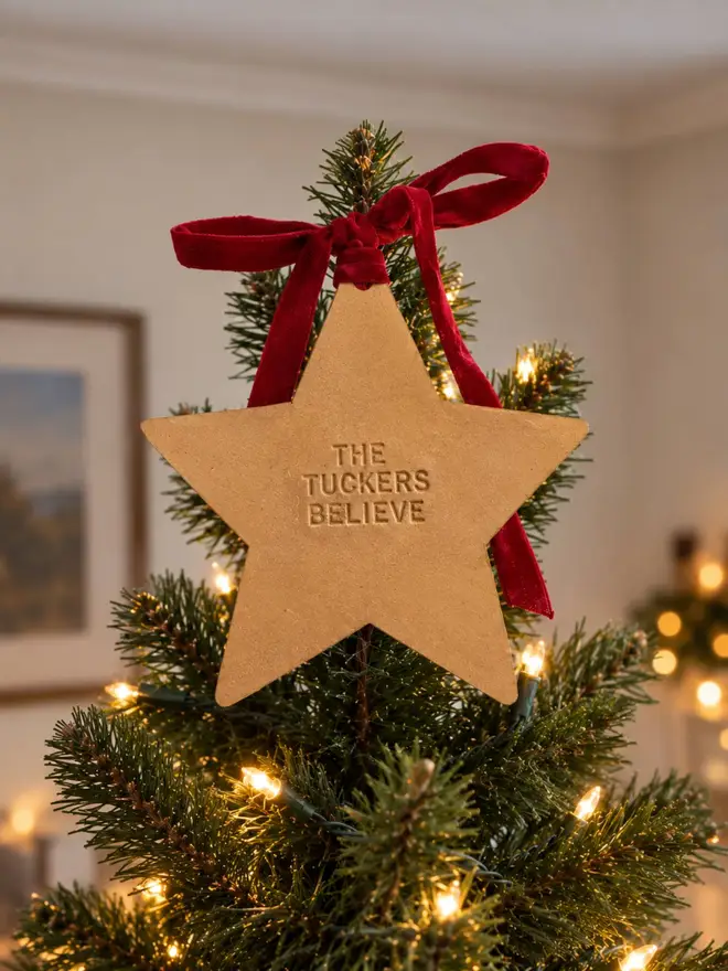 hand stamped gold leather tree topper.