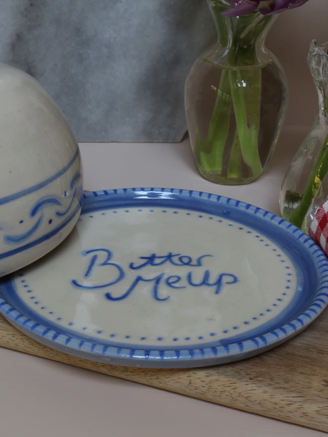 blue and white ceramic butter dish