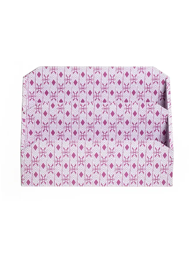 Tijan Letter Rack, a colourful patterned letter rack sitting on a white surface against a plain backdrop. 