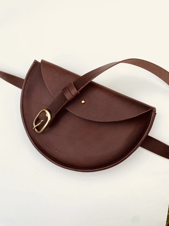 Brown leather half moon crossbody bag 