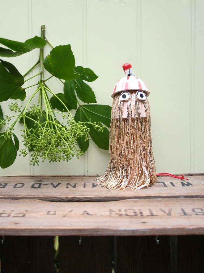 ceramic handmade Christmas tree topper decoration. gold sequin fringing tassels and bobble hat. Disco Thing