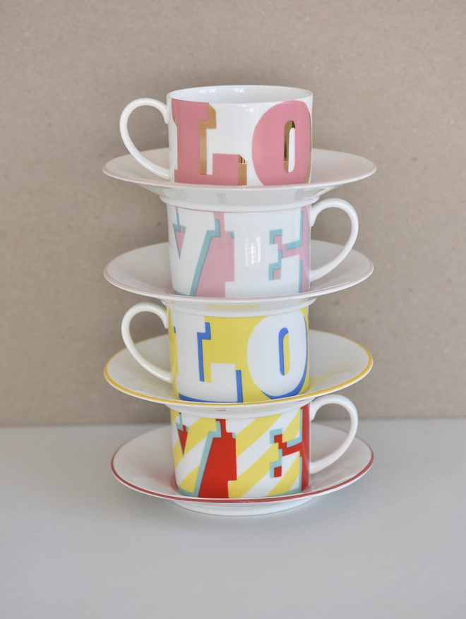 4 love cups and saucers