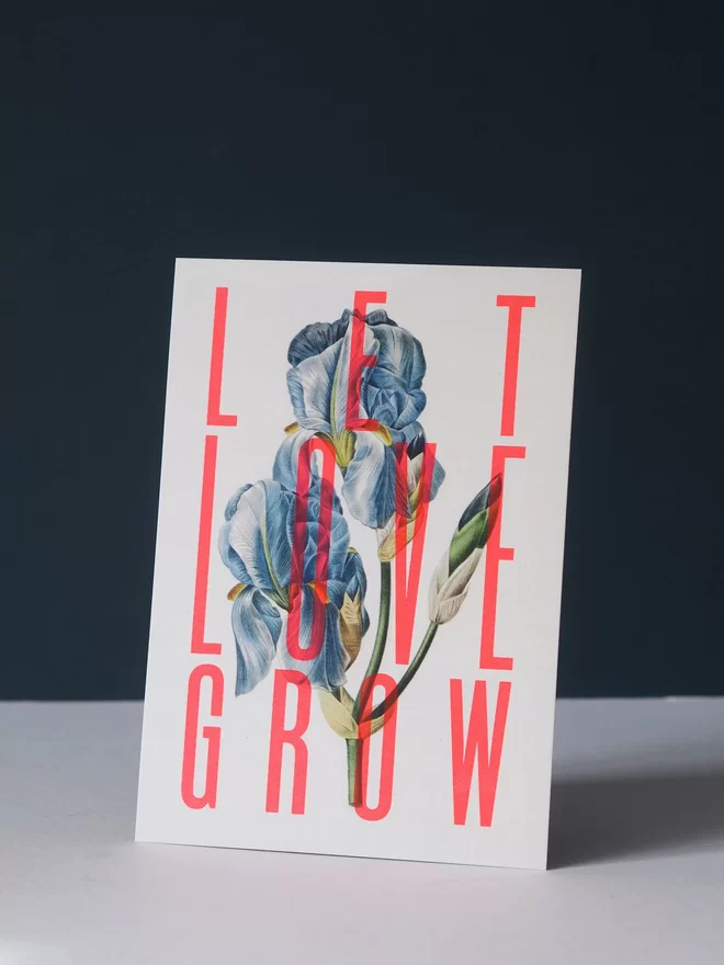 Floral Screenprint with the motivational words Let Love Grow hand screen printed over the top