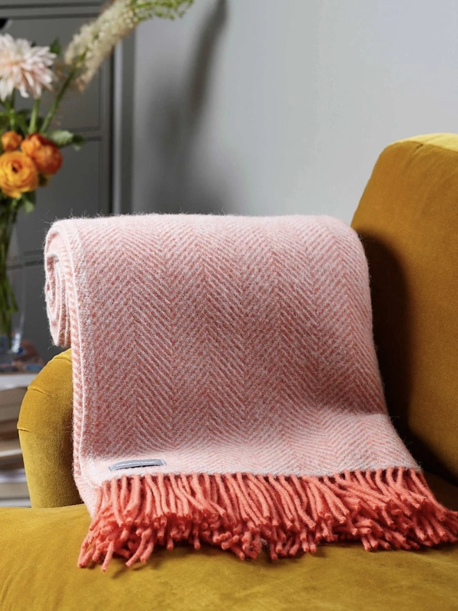 Organic Wool Throw, an organic wool throw sitting on a sofa. 