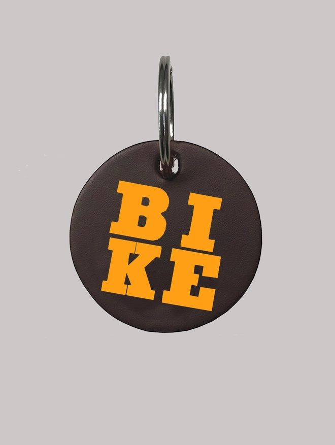 bike keyring on dark leather