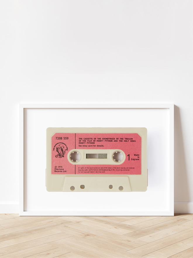 Monty Python Soundtrack Print. A large print in the shape of a cassette of the Monty Python soundtrack