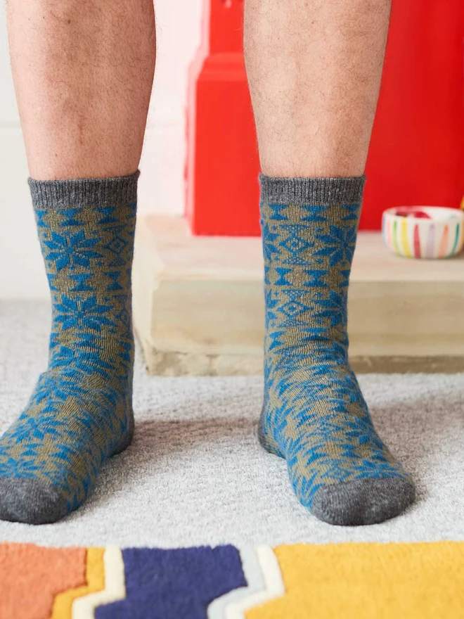 colourful patterned ankle socks, modelled in a colourful room