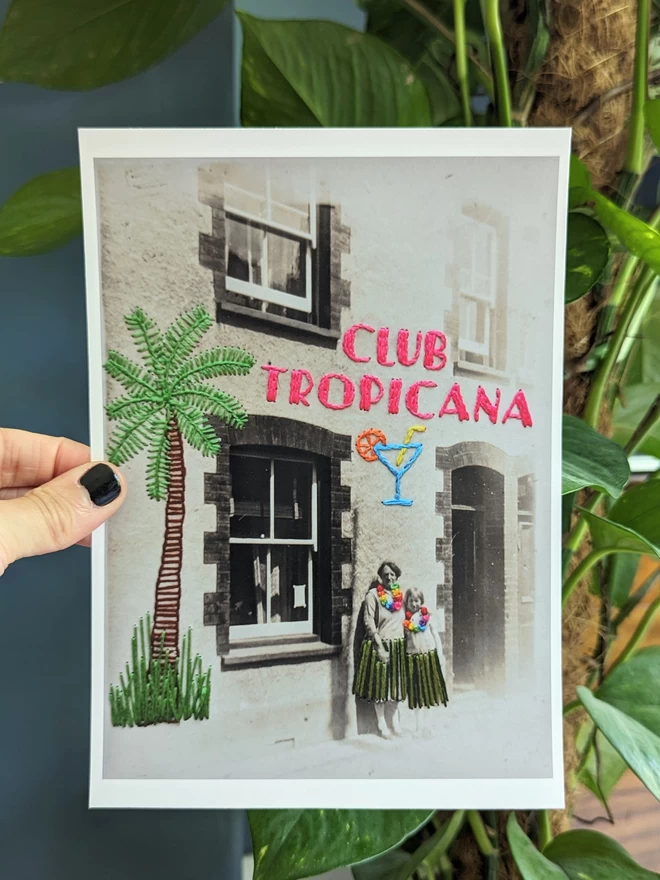  B&W photograph print, woman and child with embroidered Club tropicana and grass skirts