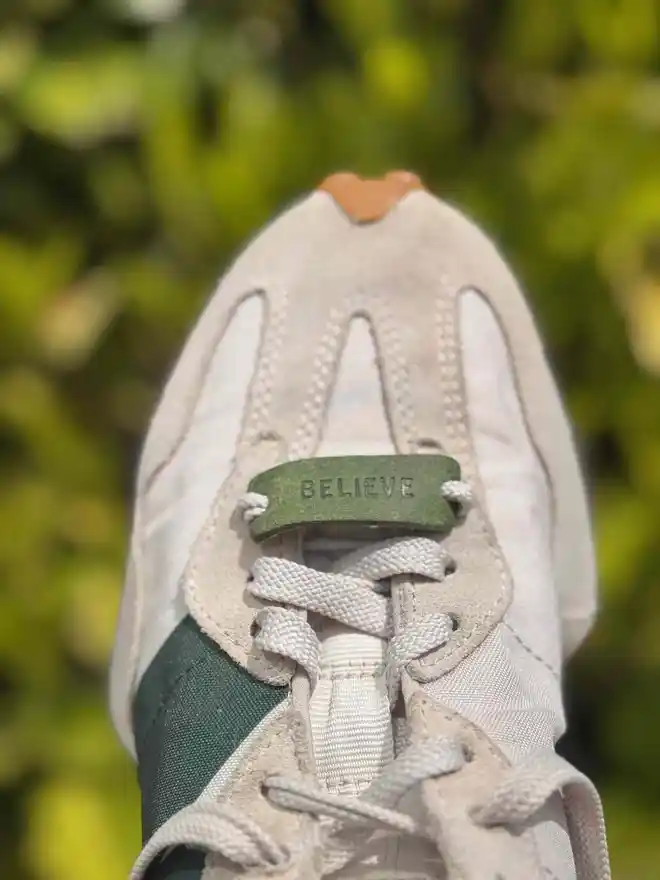 green leather trainer label