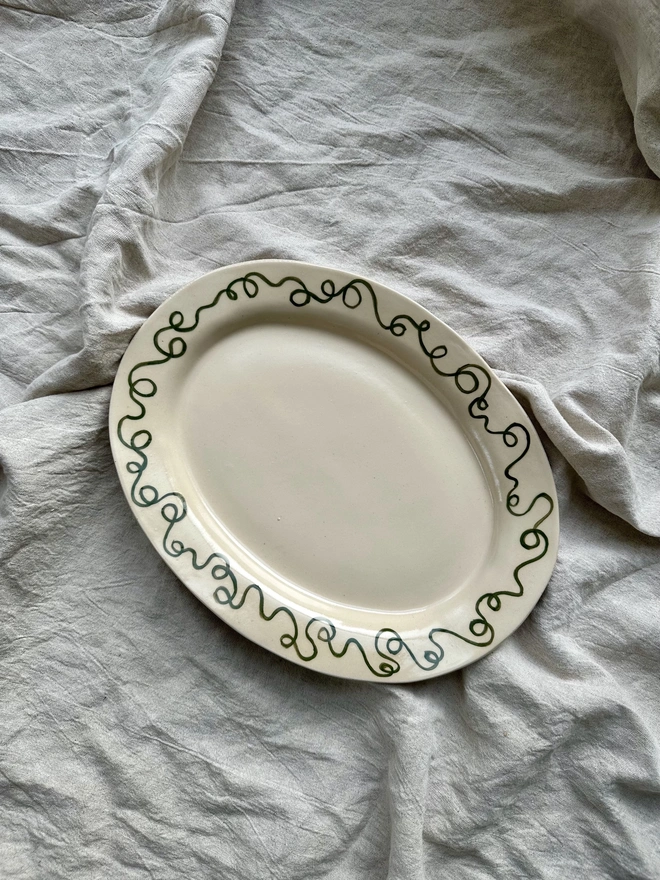 A platter with a decorated rim
