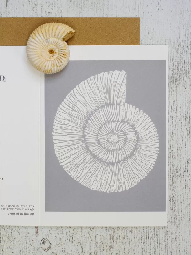 Greeting Card with an image of an Ammonite Fossil taken from an original lino print