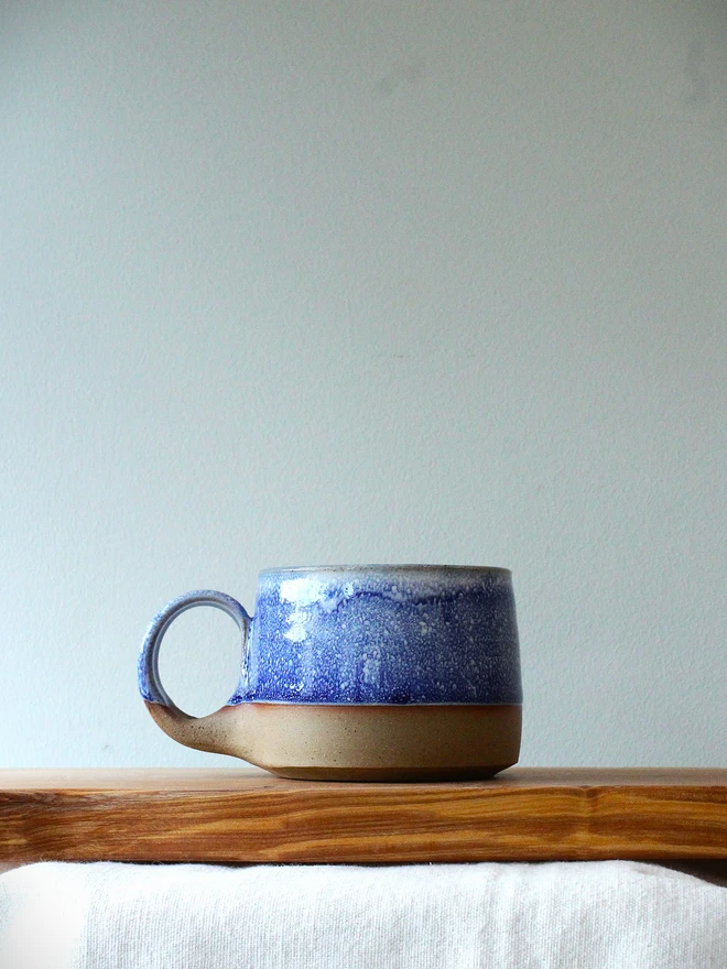 blue handmade ceramic cup