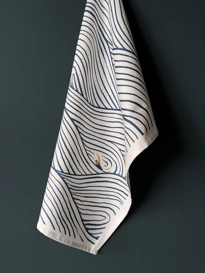 swimming wave pattern tea towel