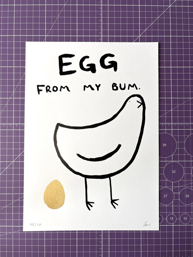 'Egg From My Bum' Print with gold foil egg
