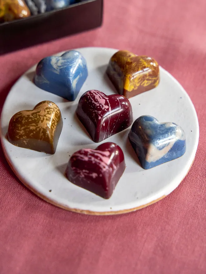 Set of four heart chocolates for Valentine's Day. 