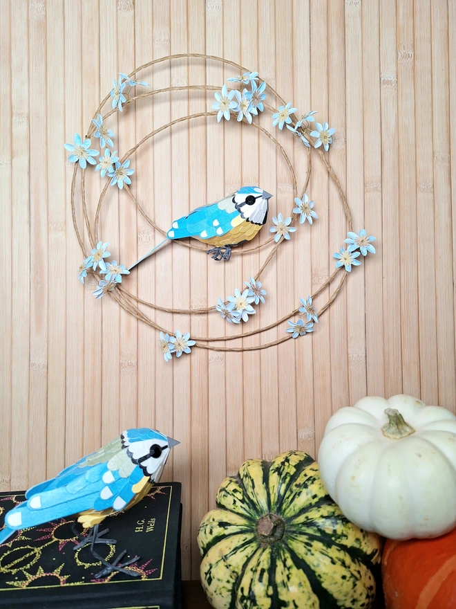Blue tit wall art sculpture on a handmade floral wreath