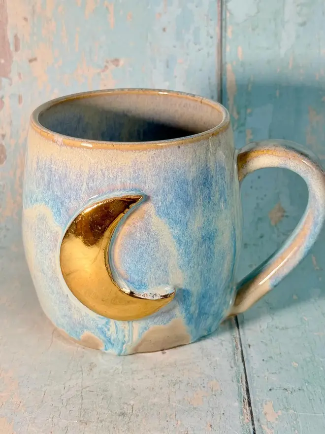 light blue moon mug