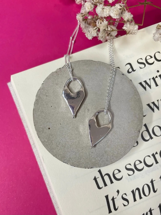 Hand made heart charms made from 100% recycled sterling silver, cute gift for girlfriend or wife for Valentine's Day or Mother's Day. Send straight to your special someone. Made by Celina C Jewellery, a small business in the UK, find on Holly and Co.