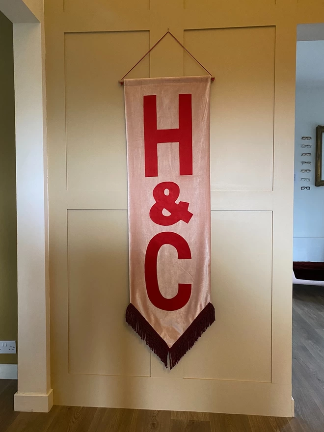 long pennant style wall hanging with custom letters