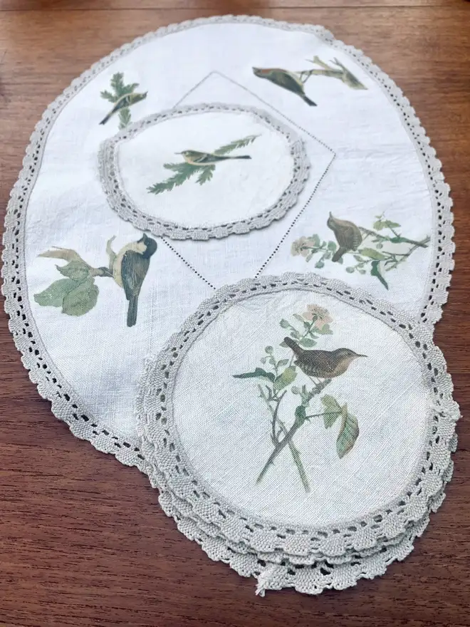 a table centrepiece cloth with matching coasters