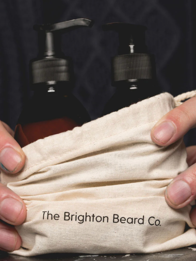 Alfriston Beard and Hair Duo. Two brown bottles with a bag.