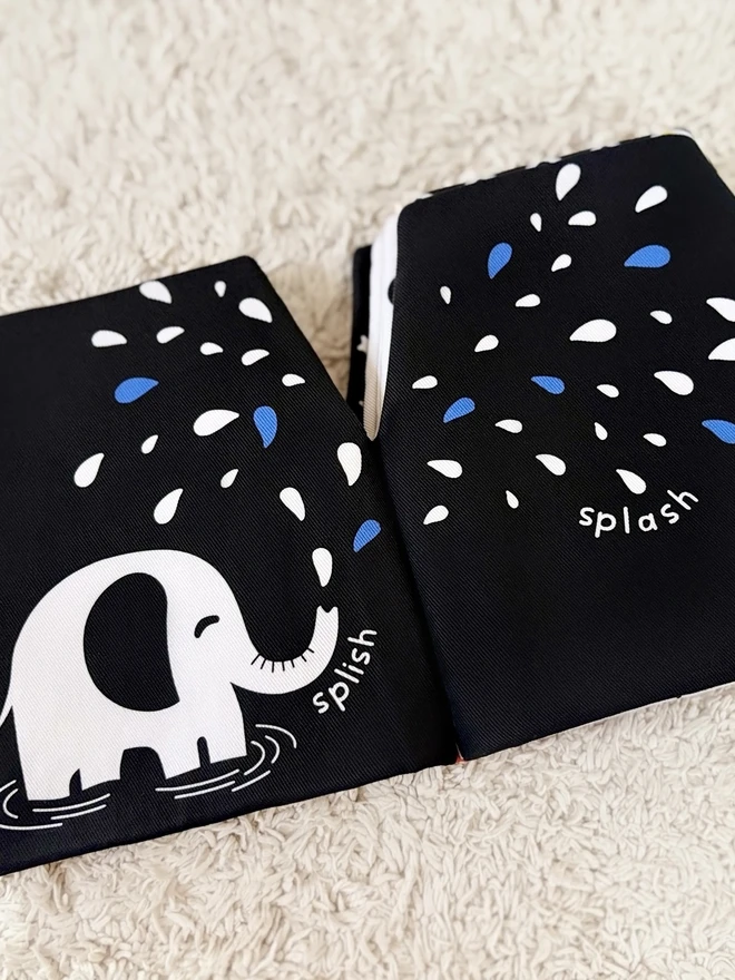 Elephant splashing water on My Quiet Book, High-contrast Soft Book