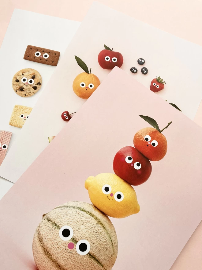 A selection of A3 Prints of fruit with faces 