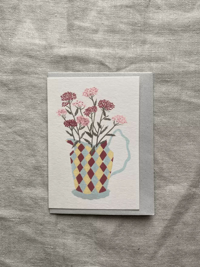 floral greetings card with yarrow in a harlequin jug.