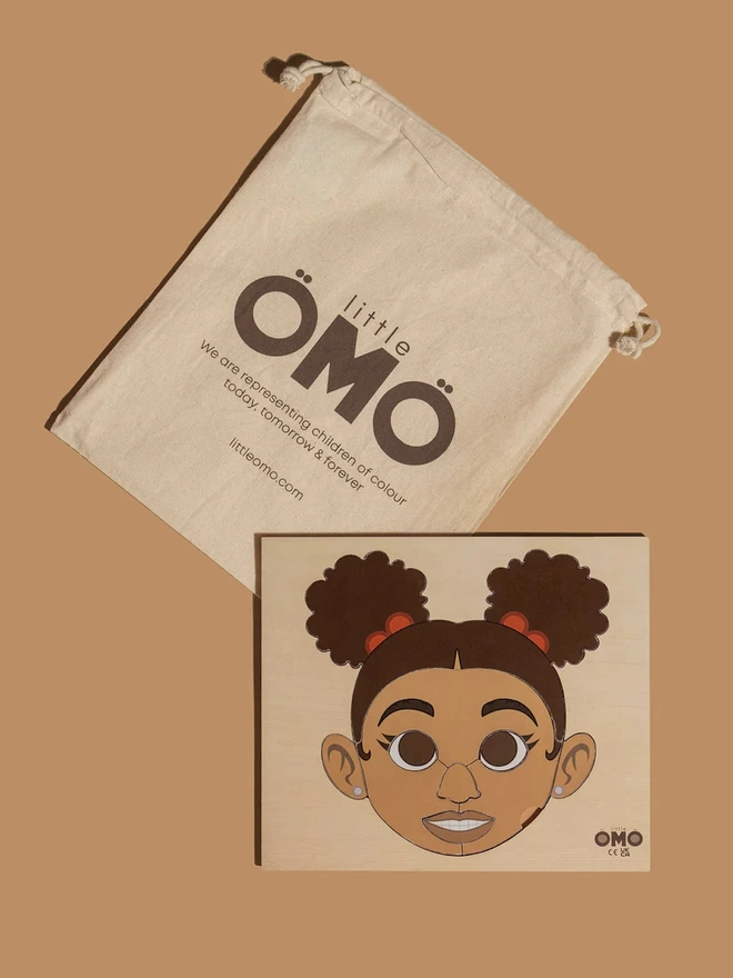 Face Puzzle - Omonike (Girl) with puzzle bag.