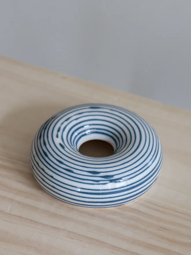 Avocado Planter White & Blue Handmade porcelain avocado planter with carved blue pattern, designed to hold an avocado seed for sprouting