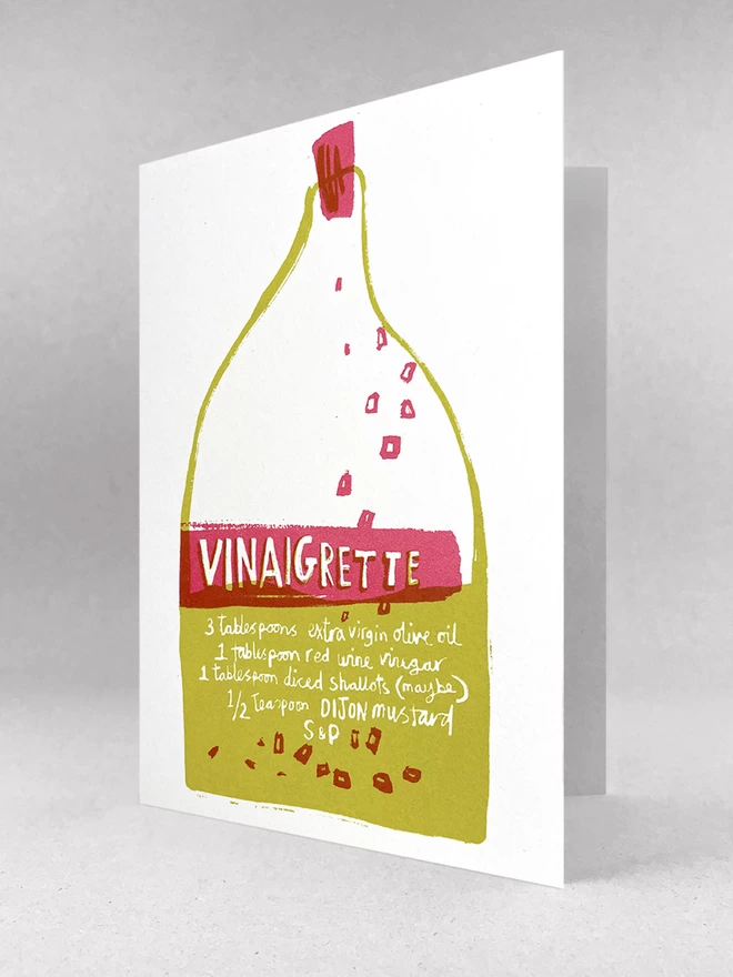 An original design, handprinted Greetings Card featuring a bottle of  Vinaigrette dressing with the recipe written on the label, made from recycled card, by Salty's Studio.