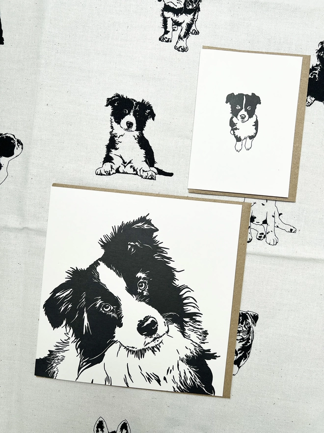 The Collie big and little card next to the collie on the tea towel