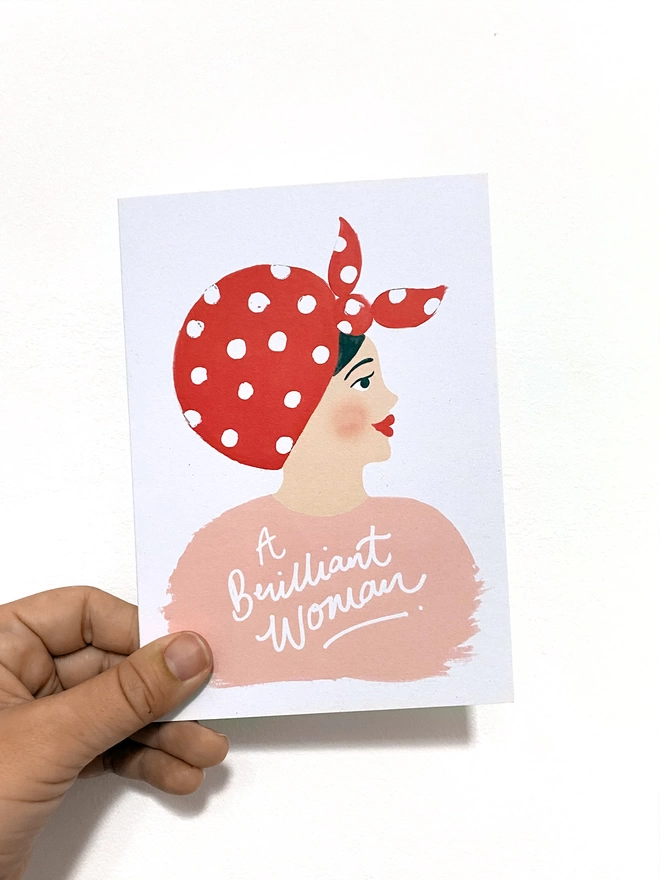 brilliant woman card in hand