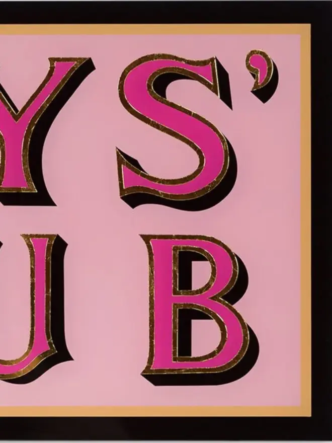 boys club pink hand painted sign. image zoomed in on lettering.