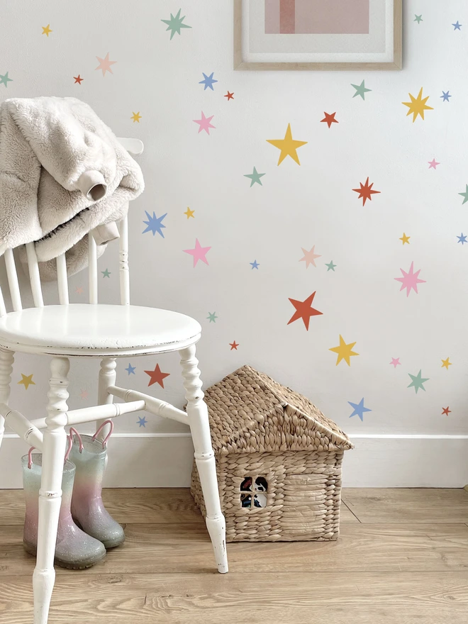 Ducks In A Row Summer Pastel Fabric Star Wall Stickers in girls bedroom with white chair and wellies