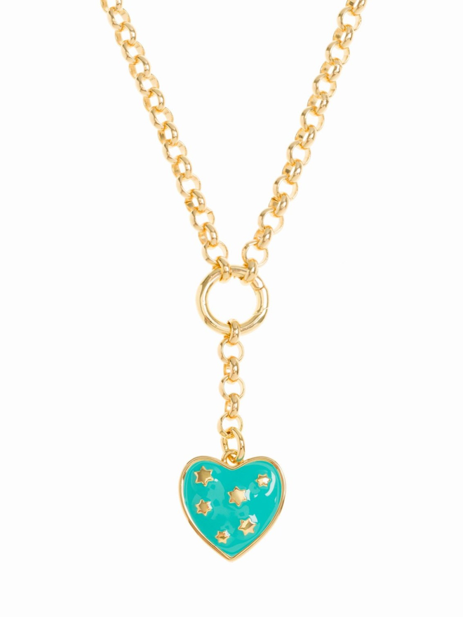 Turquoise heart studded with gold stars hanging from a gold belcher style chain 