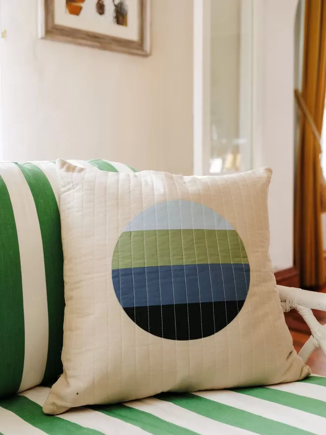 Haze Quilt Cushion On Striped Green Chair 