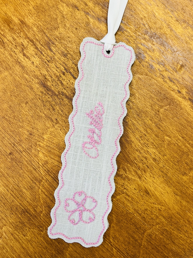 embroidered linen bookmark dusty pink thread flower