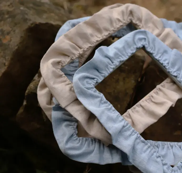 picture frames with tan and blue ruffled border