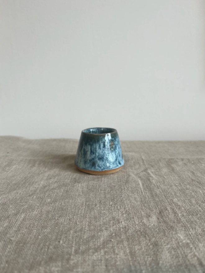 Egg Cup. A blue egg cup with attractive subtle darker speckling.