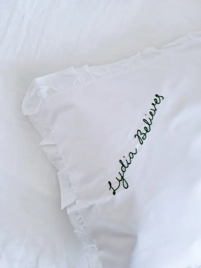 hand embroidered believe pillowcase