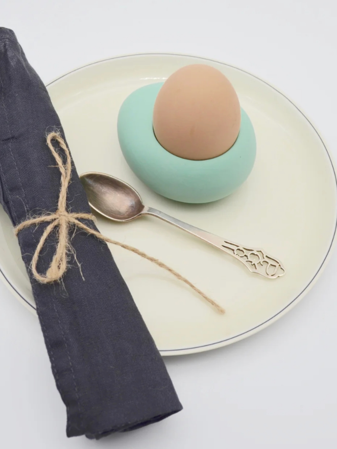 Kelly Egg Cup. A green egg cup.